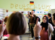 Syrians in Germany face fight fit for Kafka to see families Syrians in Germany face fight fit for Kafka to see families