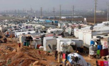 Syria refugees shrug off peace talks but dream of home
