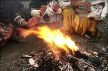 Indian teachers burn books to keep warm 