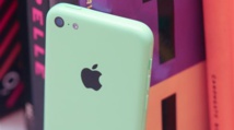 Apple delivers higher profits, but iPhone sales slip