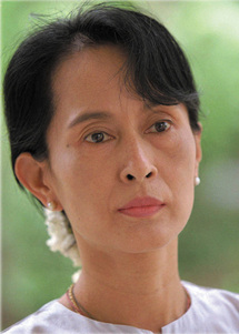Myanmar to charge Suu Kyi over American's visit