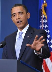 Obama hails action on healthcare bill