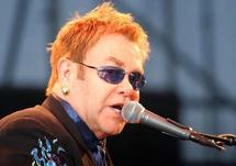 Sick Elton John postpones US gigs with Joel Sick Elton John postpones US gigs with Joel