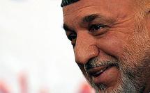 Under-pressure Karzai vows to tackle corruption