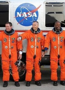 Astronaut counts down to daughter's birth Astronaut counts down to daughter's birth