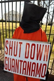 A protester calls for the closing of Guantanamo Bay A protester calls for the closing of Guantanamo Bay