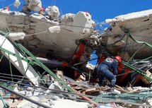 Hope emerges from the ruins of a Haiti supermarket Hope emerges from the ruins of a Haiti supermarket