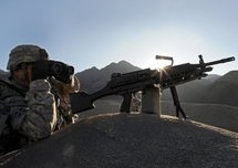 A US soldier in the mountains of Nuristan Province, 2009