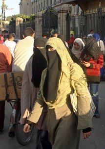 Egyptian students wearing the niqab exit Cairo University