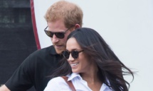 Diana's diamonds on Meghan's ring means she is 'with us,' Harry says  