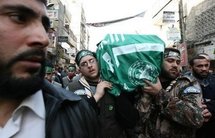 Mourners carry the coffin of Mahmud al-Mabhuh Mourners carry the coffin of Mahmud al-Mabhuh