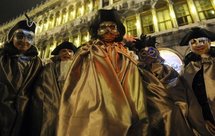Revellers don masks for Venice Carnival Revellers don masks for Venice Carnival