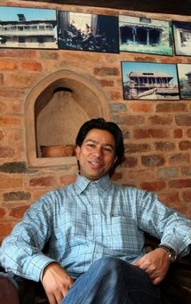 Rabindra Puri speaks during an interview in a restored 150 year-old farmhouse