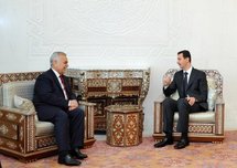 Tarek al-Hashemi with Syrian President Bashar al-Assad