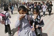 Palestinian school girls cover their faces from tear gas during clashes between Palestinians and Israeli troops Palestinian school girls cover their faces from tear gas during clashes between Palestinians and Israeli troops