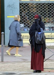 A woman wearing a niqab (the Islamic full veil) in Lyon, eastern France