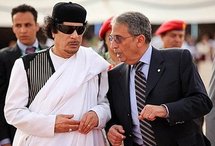 Libyan leader Moamer Kadhafi (left) with Arab League chief Amr Mussa as they wait to greet Arab leaders at the airport in Sirte. (AFP/Mahmud Turkia) Libyan leader Moamer Kadhafi (left) with Arab League chief Amr Mussa as they wait to greet Arab leaders at the airport in Sirte. (AFP/Mahmud Turkia)