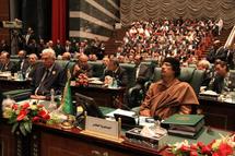Libyan leader Moamer Kadhafi speaks during the Arab Summit in the Libyan city of Sirte.