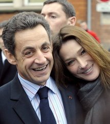 French First Lady Carla Bruni with President Nicolas Sarkozy