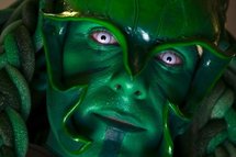 A fan of comics poses in his manga character costume. A fan of comics poses in his manga character costume.