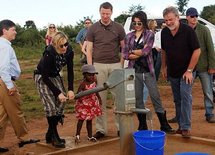 Madonna (second left) and her adopted daughter Mercy James in Malawi. Madonna (second left) and her adopted daughter Mercy James in Malawi.