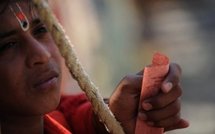 An Indian patron waits for the start of the matinee show at Prabhat Touring Talkies at Shikhar Shingnapur. (AFP/Indranil Mukherjee) An Indian patron waits for the start of the matinee show at Prabhat Touring Talkies at Shikhar Shingnapur. (AFP/Indranil Mukherjee)