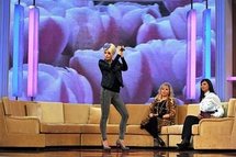 A Turkish singer performs during a show in a studio in Istanbul of TRT EI Turkiye. (AFP/Mustafa Ozer) A Turkish singer performs during a show in a studio in Istanbul of TRT EI Turkiye. (AFP/Mustafa Ozer)