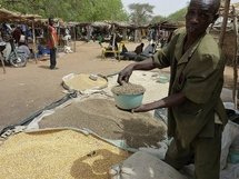 This photo, taken on 16th April, shows a man selling grain in Tibiri village, in southern Niger, an area which is facing a severe food shortage.