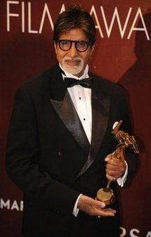 Amitabh Bachchan, in this photo taken in March 2010, holds his lifetime achievement award at the Asian Film Awards ceremony in Hong Kong. Amitabh Bachchan, in this photo taken in March 2010, holds his lifetime achievement award at the Asian Film Awards ceremony in Hong Kong.