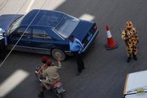 Yemeni police and soldiers secure the site of a suicide bombing that targeted the convoy of the British ambassador in Sanaa. Yemeni police and soldiers secure the site of a suicide bombing that targeted the convoy of the British ambassador in Sanaa.