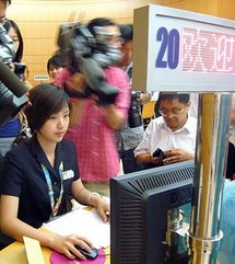 Chinese media gather to cover the first ticket sales for 2010's World Expo in Shanghai Chinese media gather to cover the first ticket sales for 2010's World Expo in Shanghai