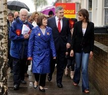 Prime Minister Gordon Brown (second right) and Minister for the Olympics and London Tessa Jowell campaign on the streets of south London.