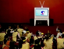 Children watch television in Guadalajara, Mexico, on 2nd March. Children watch television in Guadalajara, Mexico, on 2nd March.