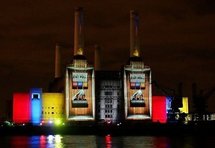 Exit polls predictions are projected on to the side of Battersea Power Station in south London.