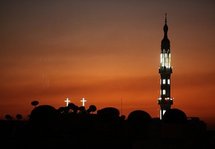 A church and a mosque are pictured at sunset in the southern Egyptian town of Nagaa Hammadi in January.