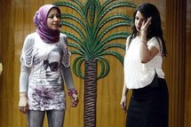 Iraqi student Marwa Abdel Karim (left) sings in Hebrew at Baghdad University's faculty of languages.