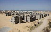 Unfinished buildings of a UN housing project in Khan Yunis refugee camp in the southern Gaza strip, in March 2010