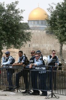 Israeli border policemen stand guard in Ras al-Amud in Arab east Jerusalem.