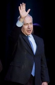 Israeli Prime Minister Benjamin Netanyahu waves to participants in the United Jewish Appeal's Walk for Israel in Toronto.