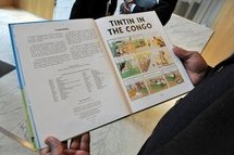 Plaintiff Bienvenu Mbutu Mondondo reads an English language version of 'Tintin in the Congo' at the Brussels Court on 12th May. Plaintiff Bienvenu Mbutu Mondondo reads an English language version of 'Tintin in the Congo' at the Brussels Court on 12th May.