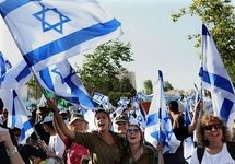 Israeli youths from rural communities wave national flags during a march in Jerusalem in salute to the city and the Israeli army, following Israel's raid on the aid flotilla bound for the Gaza Strip that left nine people dead. Israeli youths from rural communities wave national flags during a march in Jerusalem in salute to the city and the Israeli army, following Israel's raid on the aid flotilla bound for the Gaza Strip that left nine people dead.