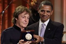 US President Barack Obama (right) presents Paul McCartney (left) with the third Gershwin Prize for Popular Song at the White House in Washington, DC on 2nd June. US President Barack Obama (right) presents Paul McCartney (left) with the third Gershwin Prize for Popular Song at the White House in Washington, DC on 2nd June.