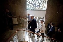 Israeli Prime Minister Benjamin Netanyahu (centre) arrives to the weekly cabinet meeting held at his office in Jerusalem.