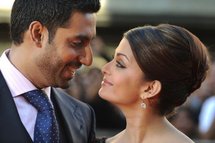 Abhishek Bachchan (left) and his wife Aishwarya Rai Bachchan attend the world premiere of 'Raavan'. Abhishek Bachchan (left) and his wife Aishwarya Rai Bachchan attend the world premiere of 'Raavan'.