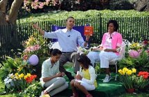 US President Barack Obama (left) with US First Lady Michelle Obama (right), and daughters Malia (seated left) and Sasha US President Barack Obama (left) with US First Lady Michelle Obama (right), and daughters Malia (seated left) and Sasha