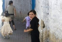 Children play in an alleyway in the al-Bustan area of Arab east Jerusalem.