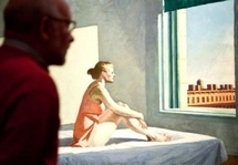 This photograph shows a visitor looking at a painting by US artist Edward Hopper, entitled 'Morning Su', during an exhibition at the Fondazione Museo in Rome. This photograph shows a visitor looking at a painting by US artist Edward Hopper, entitled 'Morning Su', during an exhibition at the Fondazione Museo in Rome.