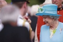 Britain's Queen Elizabeth II greets well-wishers during a garden reception at Rideau Hall Ottawa, Canada, on 30th June.