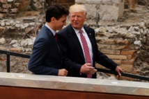 Trump to leave G7 summit early as leaders gather for second day