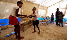 Haitian orphans paint, photograph their tragedy